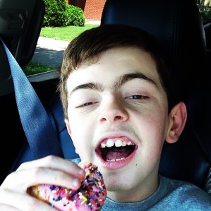 Since we're on the subject, here's me failing at both the above mentioned goals at the same time: Feeding my kid donuts for breakfast!! LOL